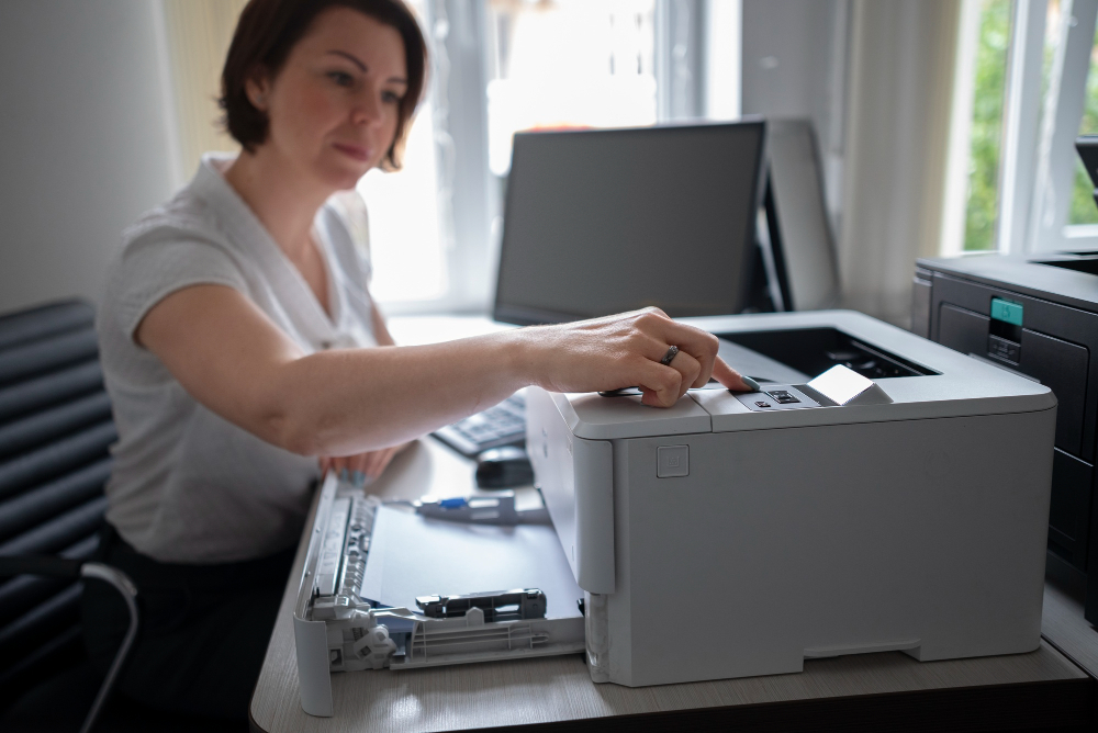 woman using printer office